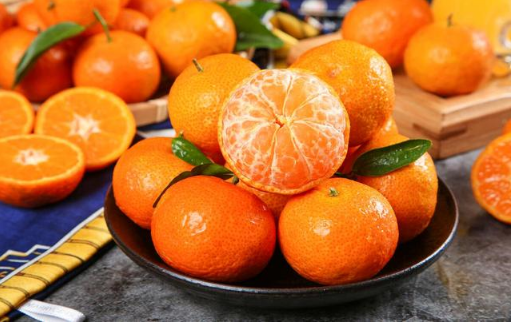 砂糖橘和橙子哪个vc含量高一些1